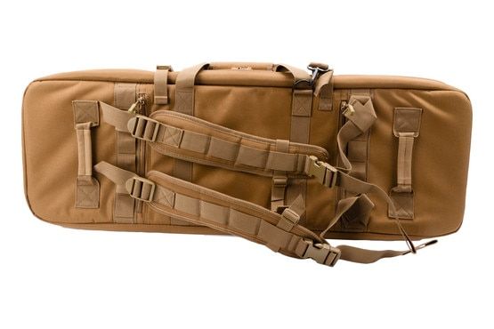 Double rifle case with shoulder straps.